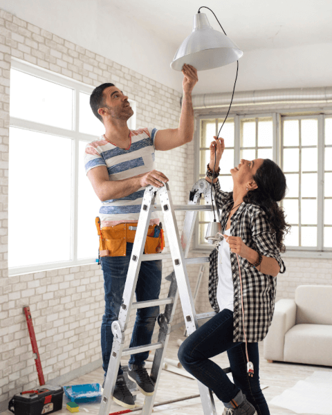 A couple renovating a house